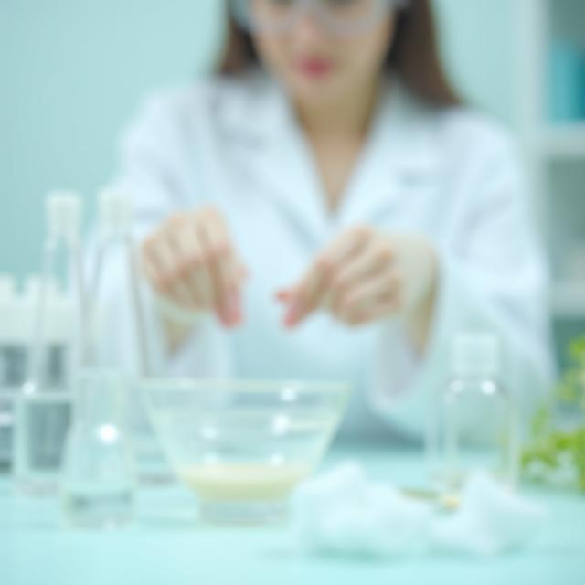 Formulation chemist blending botanical cream